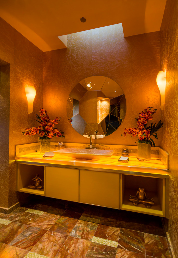 Inspiration for a contemporary powder room remodel in Las Vegas with yellow countertops