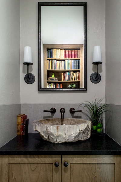 Inspiration for a small transitional gray tile powder room remodel in Austin with a vessel sink, shaker cabinets, medium tone wood cabinets, granite countertops, a two-piece toilet and gray walls