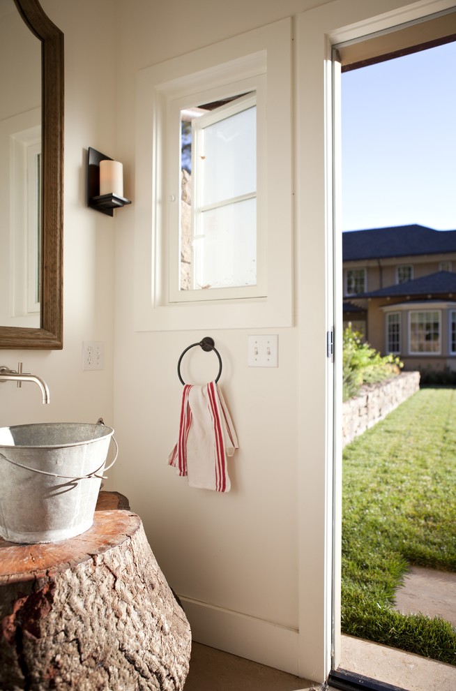 Inspiration for a farmhouse powder room remodel in San Francisco with a vessel sink