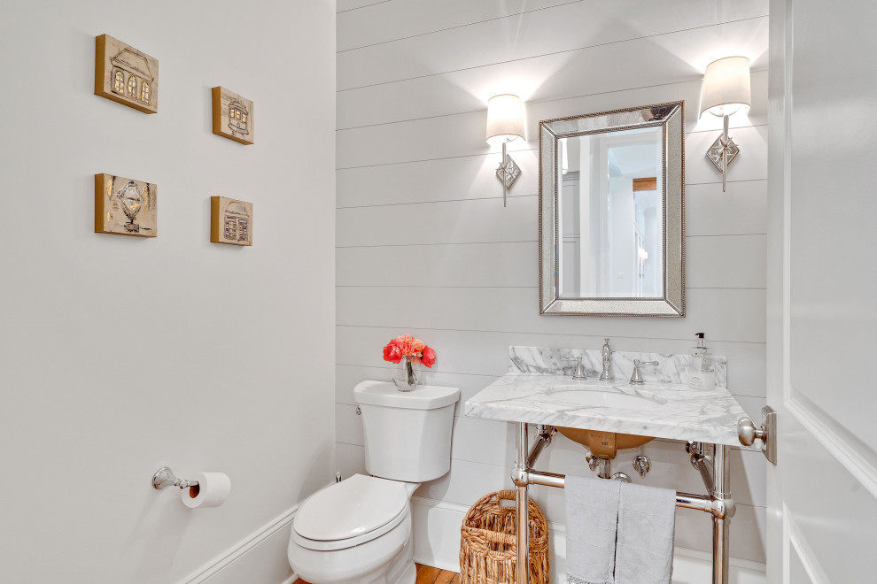 Example of a transitional powder room design in New Orleans