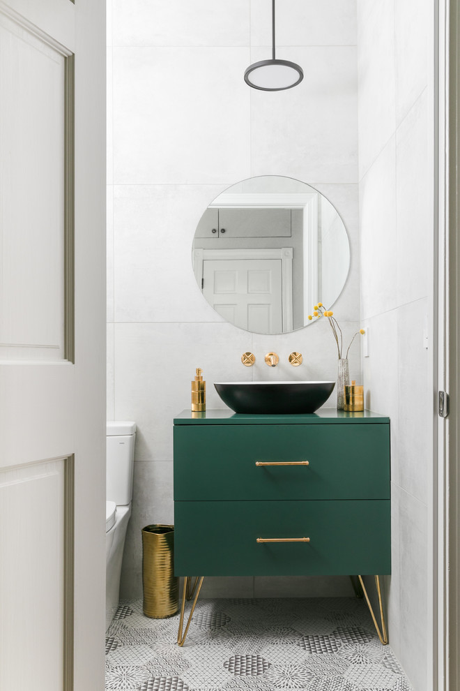 Small contemporary cloakroom in Boston with flat-panel cabinets, green cabinets, grey tiles, a vessel sink, grey floors, green worktops, feature lighting, a freestanding vanity unit and a wallpapered ceiling.