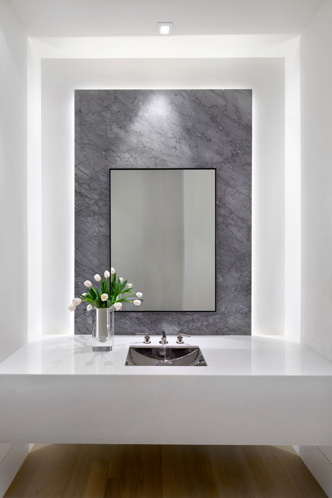 Design ideas for a contemporary cloakroom in San Francisco with a submerged sink, grey tiles, marble tiles and white worktops.