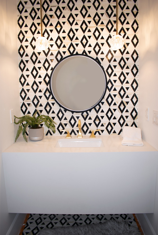 Transitional powder room photo in Orange County