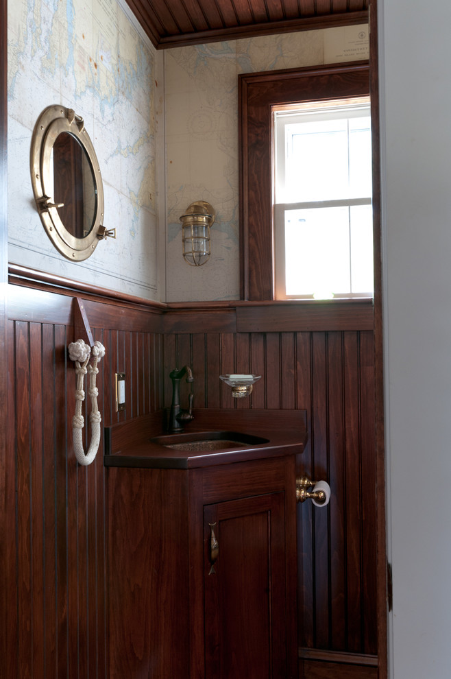 Inspiration for a small traditional cloakroom in Boston with a submerged sink, recessed-panel cabinets, medium wood cabinets, wooden worktops, medium hardwood flooring and brown worktops.