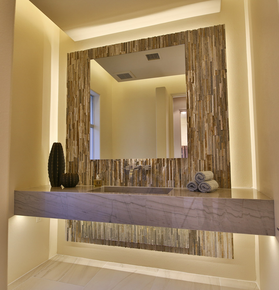 Medium sized contemporary cloakroom in Los Angeles with stone tiles, porcelain flooring, an integrated sink, quartz worktops, open cabinets, beige cabinets, beige tiles, beige walls and beige floors.