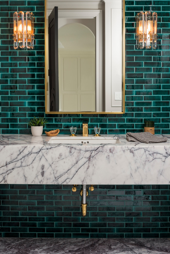 Powder room - mid-sized transitional green tile marble floor and black floor powder room idea in New York with green walls, a drop-in sink, marble countertops and white countertops