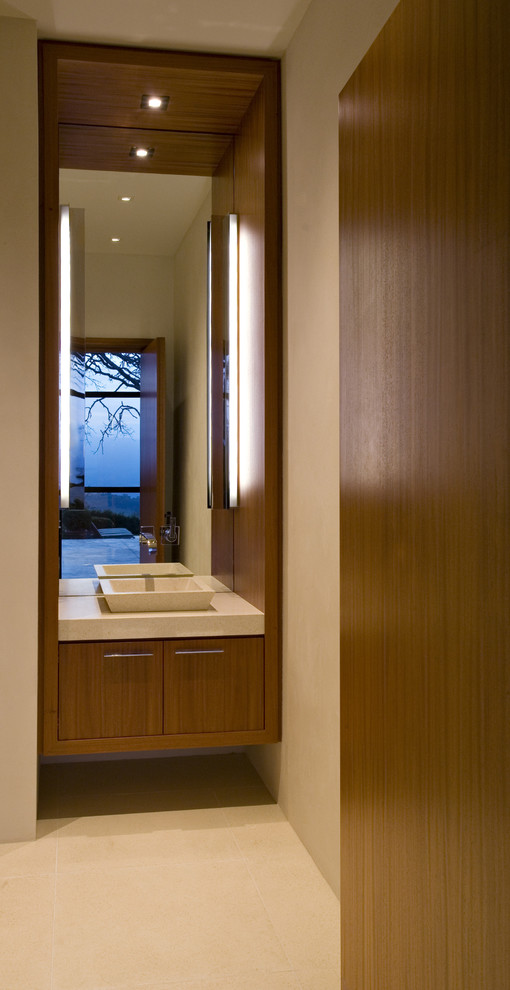 Foto di un bagno di servizio moderno con top beige