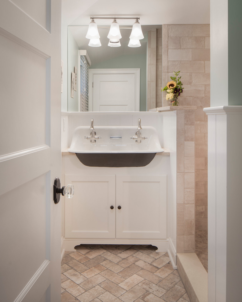 Powder room - small transitional beige tile and ceramic tile brick floor and beige floor powder room idea in Other with recessed-panel cabinets, white cabinets, a trough sink, quartz countertops, a two-piece toilet and beige walls