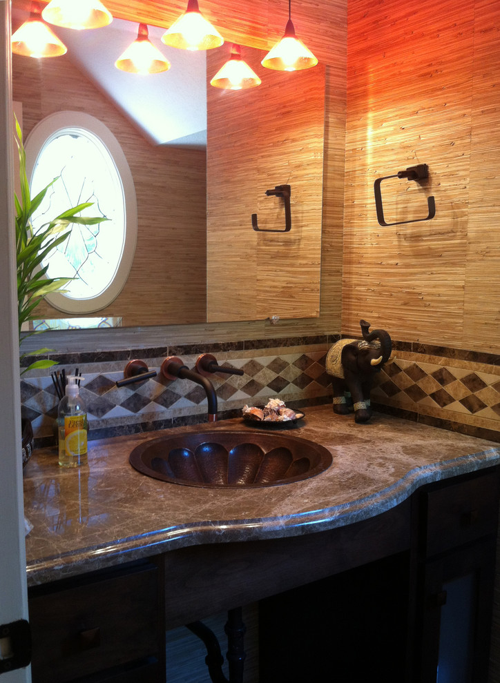 Asian multicolored tile powder room photo in Houston with a drop-in sink and marble countertops