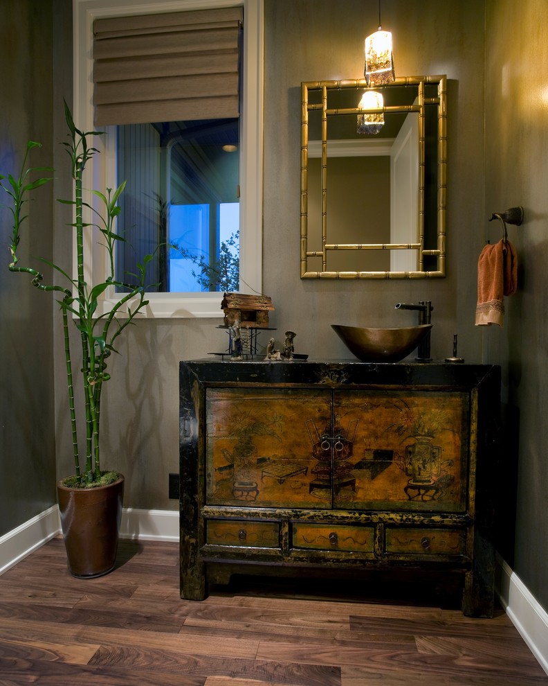Inspiration for a contemporary powder room remodel in Portland with a vessel sink