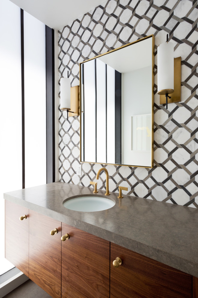 Inspiration for a mid-century modern marble tile powder room remodel in Los Angeles