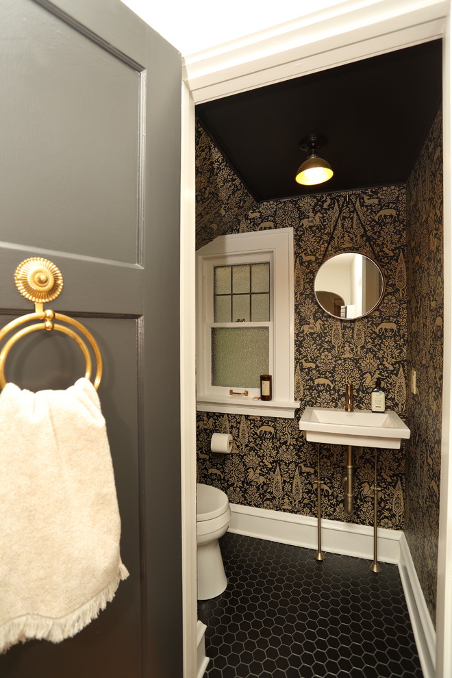 Powder room - small transitional ceramic tile powder room idea in New York with a two-piece toilet, brown walls and a wall-mount sink