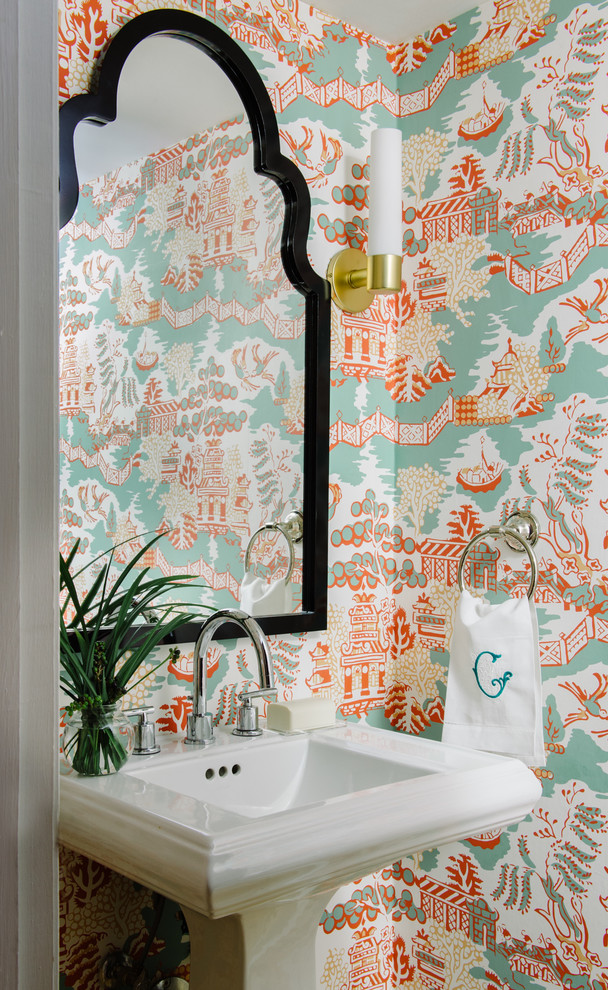 Inspiration for a small transitional powder room remodel in Austin with multicolored walls and a pedestal sink