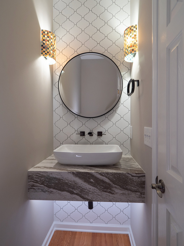 Example of an eclectic powder room design in Charleston