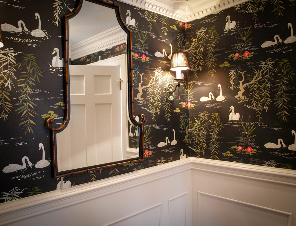 This is an example of a traditional cloakroom in Cleveland with dark hardwood flooring.