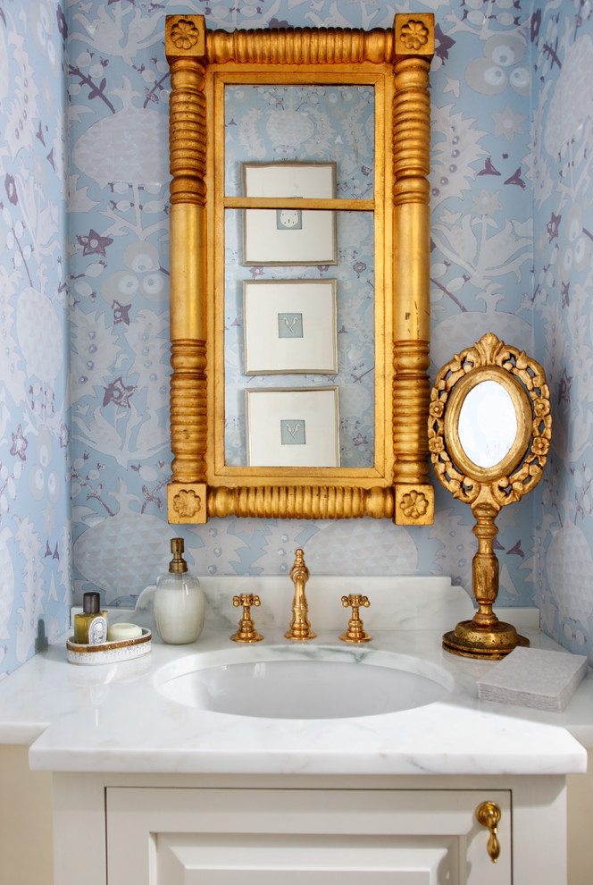 Contemporary cloakroom in DC Metro with a submerged sink, raised-panel cabinets, white cabinets and white worktops.