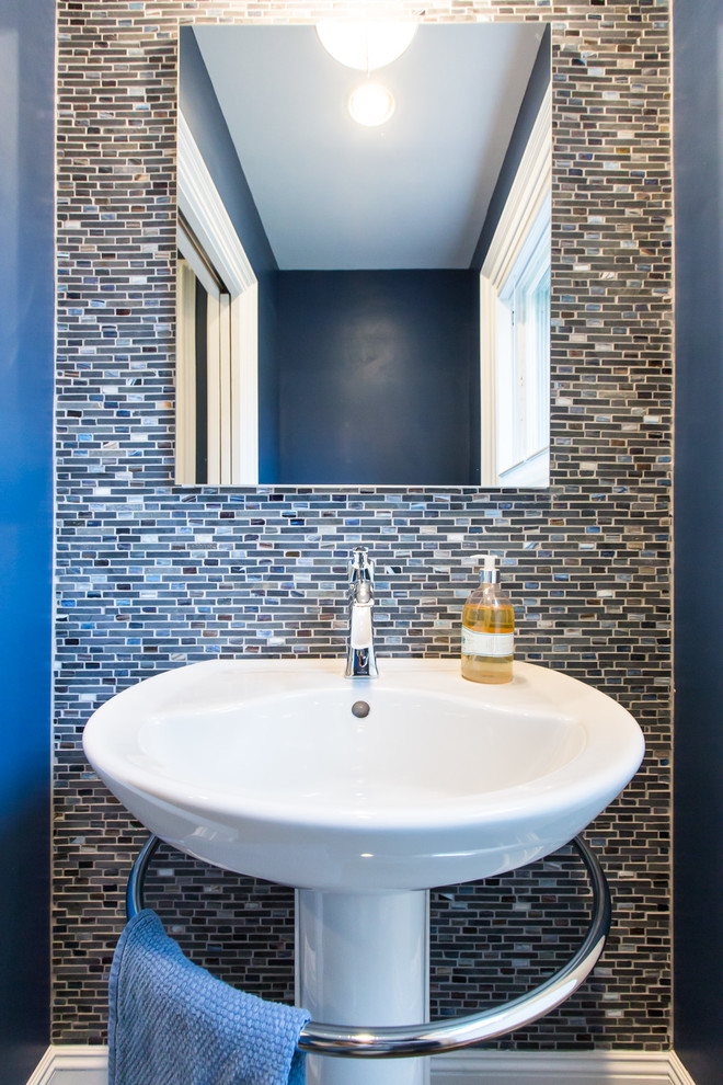 Contemporary cloakroom in Boston with a pedestal sink and multi-coloured tiles.