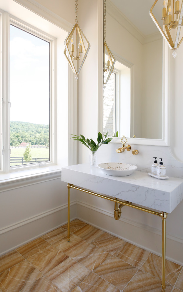 На фото: туалет среднего размера в стиле неоклассика (современная классика) с унитазом-моноблоком, белой плиткой, белыми стенами, настольной раковиной, желтым полом и белой столешницей
