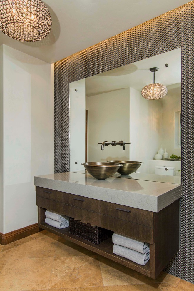 Inspiration for a medium sized contemporary cloakroom in San Diego with a vessel sink, flat-panel cabinets, engineered stone worktops, brown tiles, metal tiles, grey walls, limestone flooring and dark wood cabinets.