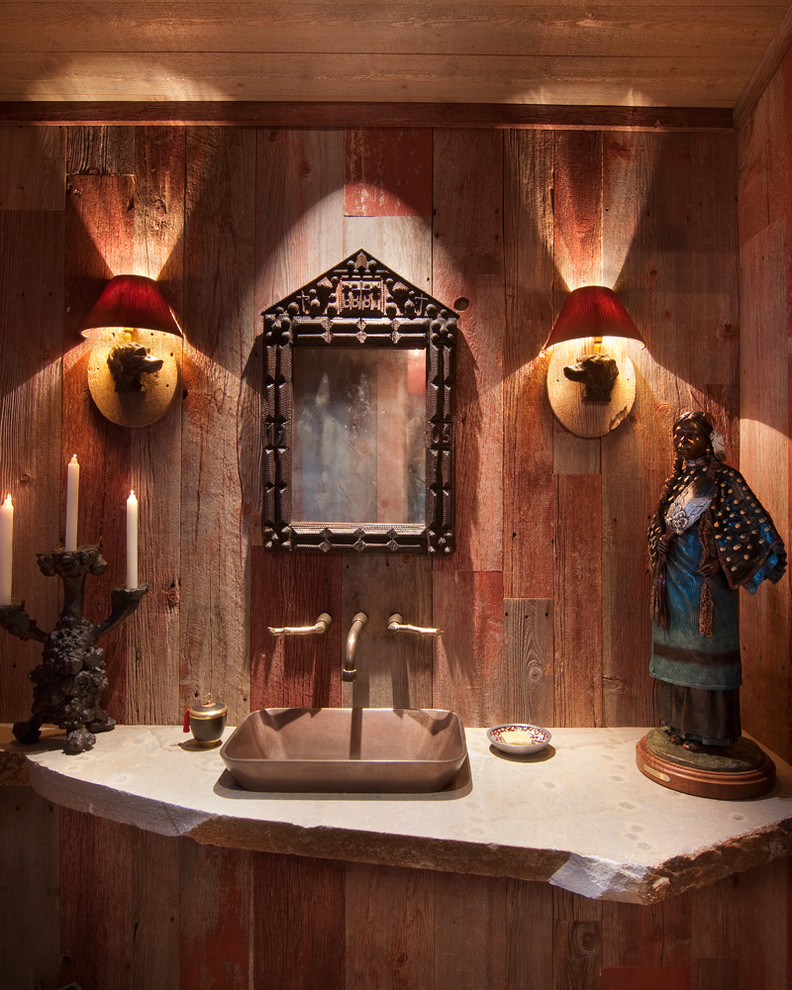 Inspiration for a rustic powder room remodel in Sacramento with a vessel sink