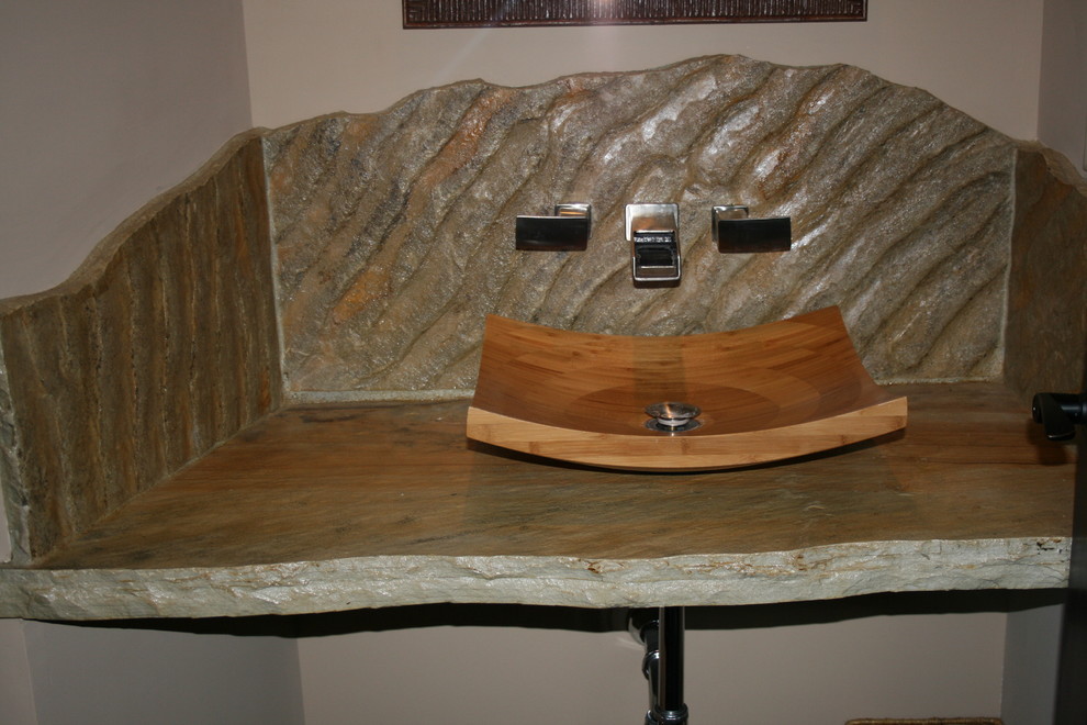 Photo of a medium sized contemporary cloakroom in Charlotte with beige walls and a vessel sink.