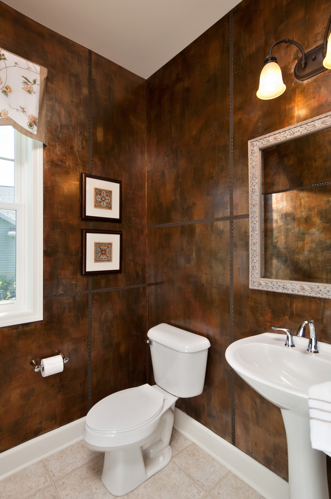 This is an example of a medium sized contemporary cloakroom in New York with a two-piece toilet, brown walls, ceramic flooring and a pedestal sink.