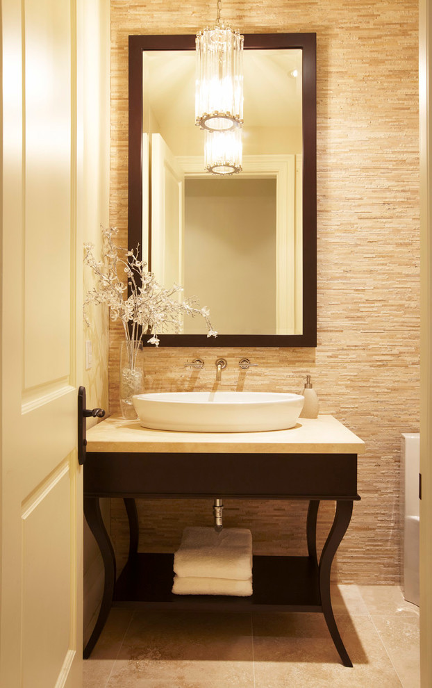 This is an example of a medium sized traditional cloakroom in Toronto with open cabinets, dark wood cabinets, beige tiles, brown tiles, stone tiles, travertine flooring, a vessel sink, marble worktops and brown floors.