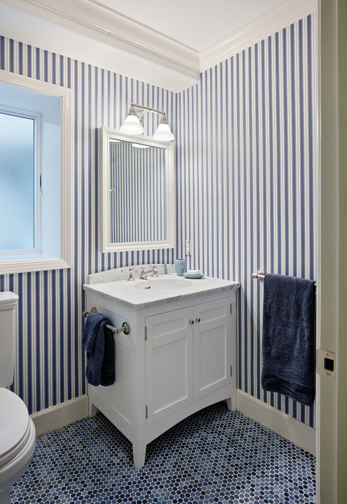 Powder room - traditional mosaic tile blue floor powder room idea in San Francisco with multicolored walls