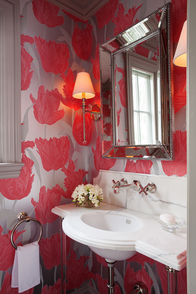 Example of a small transitional powder room design in San Francisco with an undermount sink, multicolored walls and white countertops