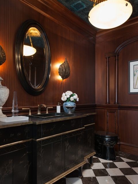 Large classic cloakroom in Los Angeles with freestanding cabinets, black cabinets, a one-piece toilet, brown walls, marble flooring, a built-in sink, wooden worktops and multi-coloured floors.