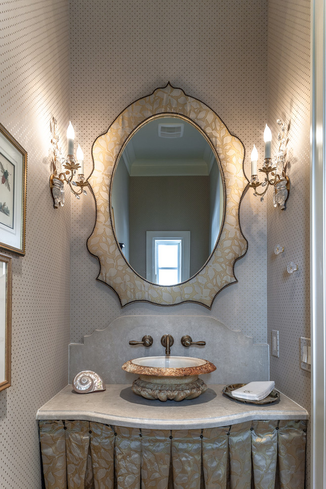 Inspiration for a traditional cloakroom in Houston with a vessel sink.