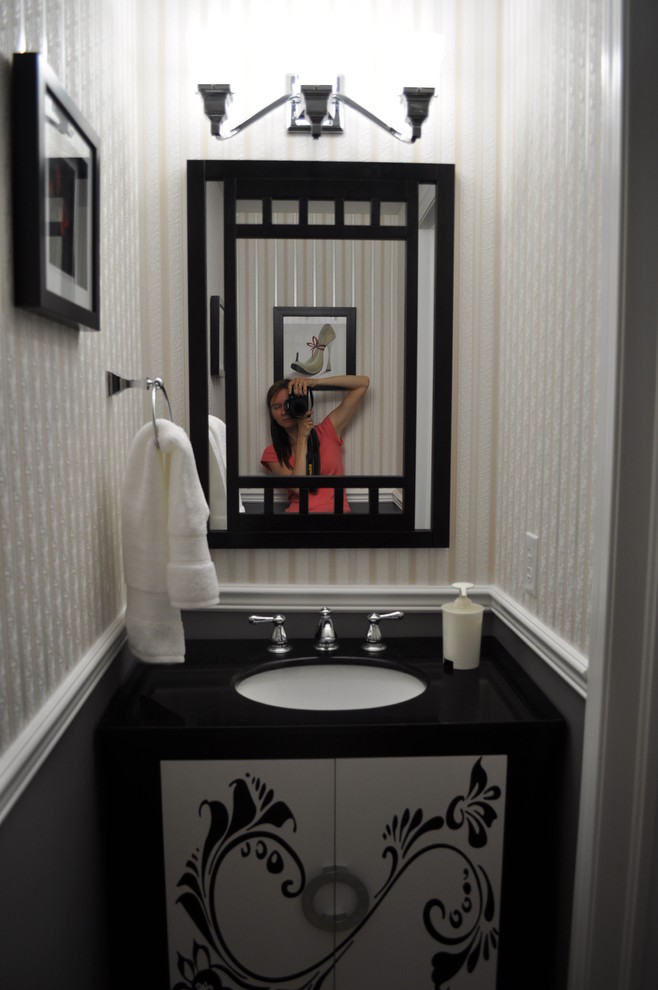 Inspiration for an eclectic powder room remodel in Toronto