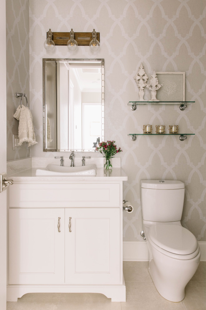 Design ideas for a classic cloakroom in Other with recessed-panel cabinets, white cabinets, a two-piece toilet, grey walls, a built-in sink, grey floors, white worktops, a built in vanity unit and wallpapered walls.