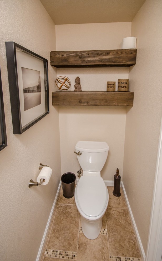 Design ideas for a medium sized traditional cloakroom in San Diego with open cabinets, dark wood cabinets, a two-piece toilet, beige walls, porcelain flooring and beige floors.