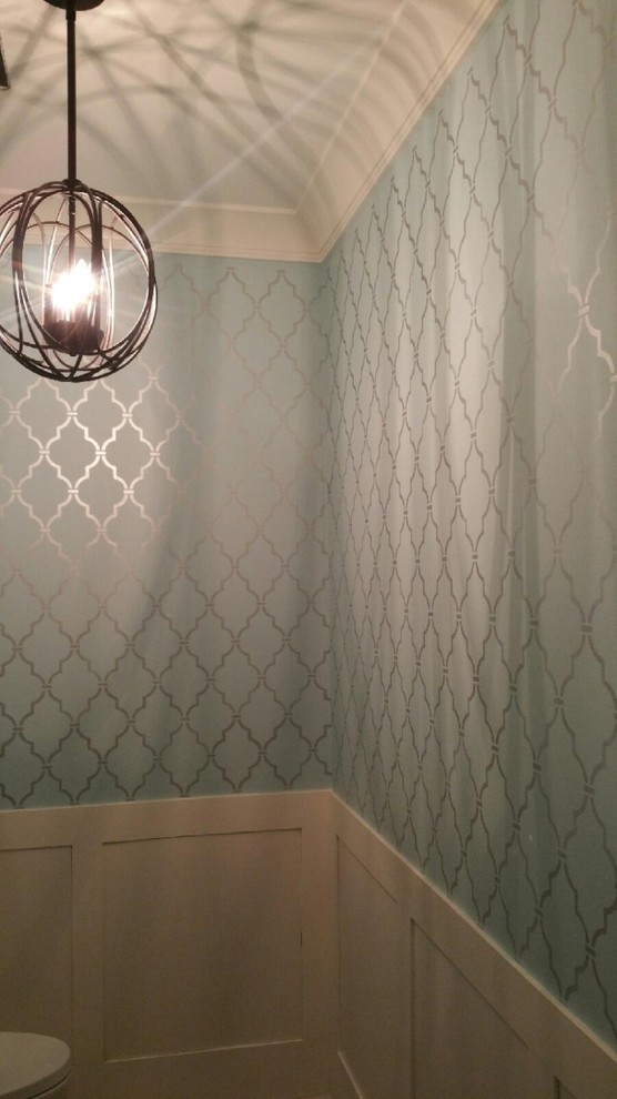 Immagine di un bagno di servizio design di medie dimensioni con pareti blu