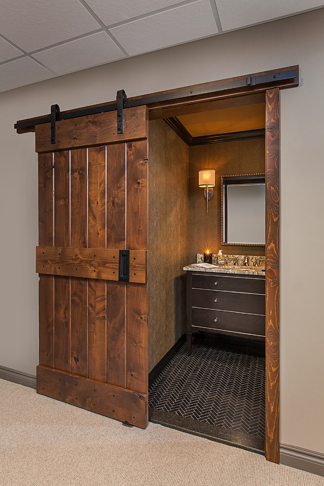 Inspiration for a small traditional cloakroom in Detroit with freestanding cabinets, a two-piece toilet, black tiles, mosaic tiles, brown walls, marble flooring, a submerged sink, granite worktops and brown cabinets.