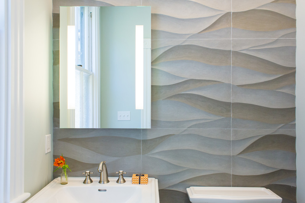 Design ideas for a beach style cloakroom in Boston with grey tiles.