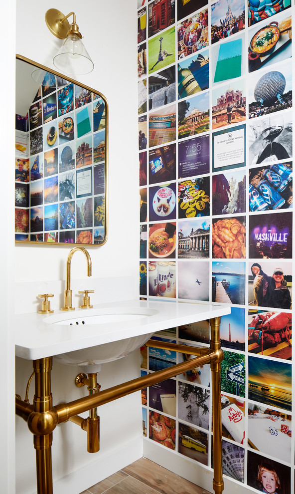 Inspiration for a small contemporary cloakroom in DC Metro with multi-coloured walls, porcelain flooring, engineered stone worktops, brown floors, a submerged sink, white worktops and a feature wall.