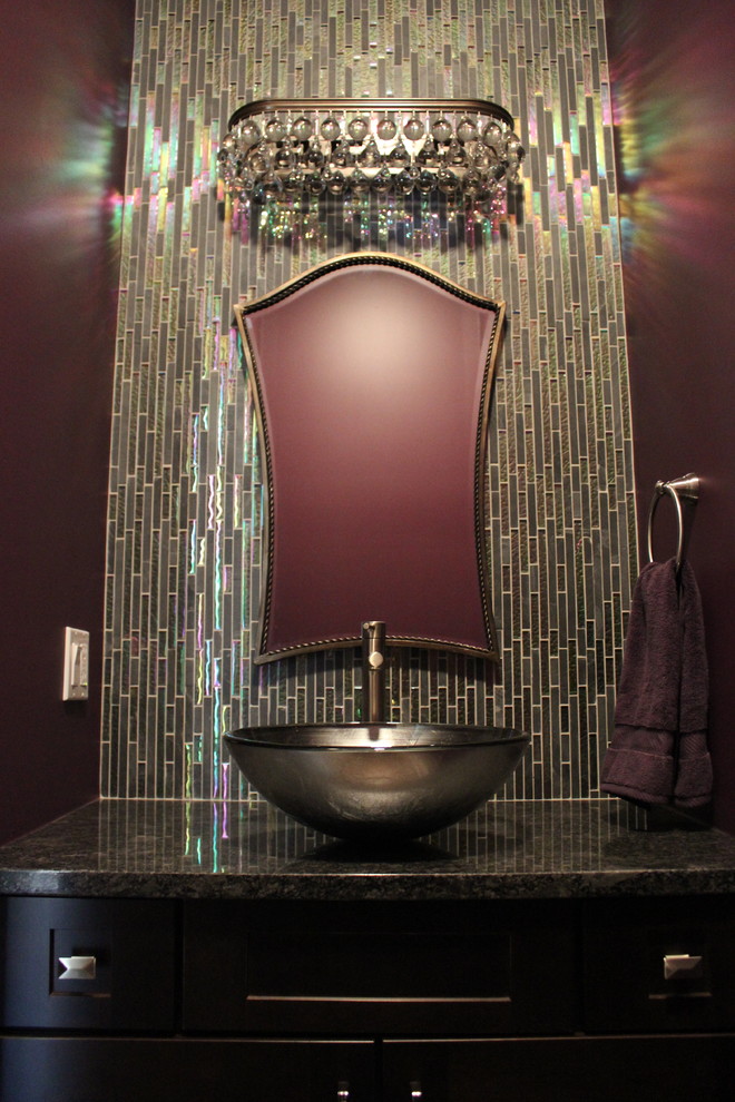Inspiration for a small contemporary cloakroom in Chicago with a vessel sink, shaker cabinets, dark wood cabinets, granite worktops, multi-coloured tiles, glass tiles and purple walls.