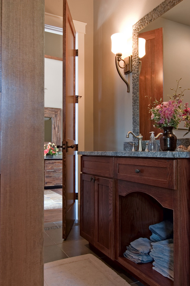Example of a mountain style powder room design in Seattle
