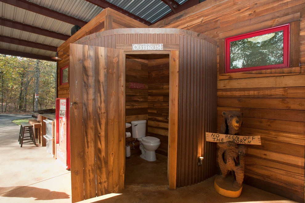 Design ideas for a rustic cloakroom in Dallas with a two-piece toilet.
