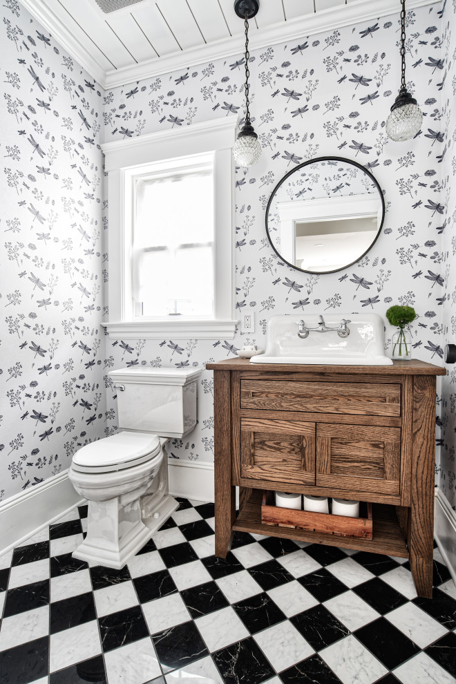 Exemple d'un WC et toilettes chic en bois brun avec un placard à porte shaker, WC séparés, un mur multicolore, un lavabo posé, un plan de toilette en bois, un sol multicolore et un plan de toilette marron.