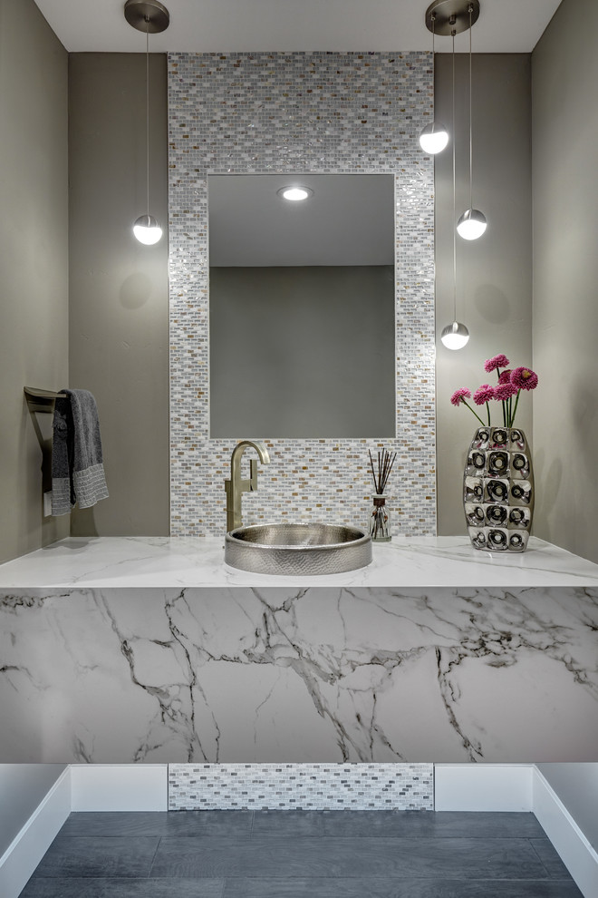 Example of a mid-sized trendy gray floor and dark wood floor powder room design in Sacramento with gray walls, a vessel sink and white countertops