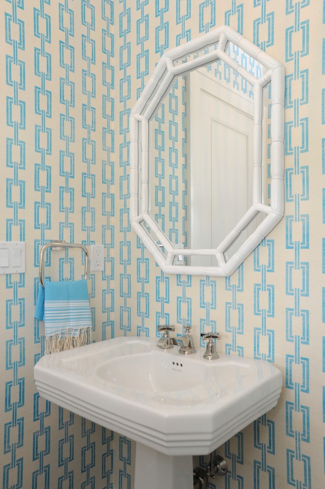 Photo of a beach style cloakroom in Boston with a pedestal sink and multi-coloured walls.