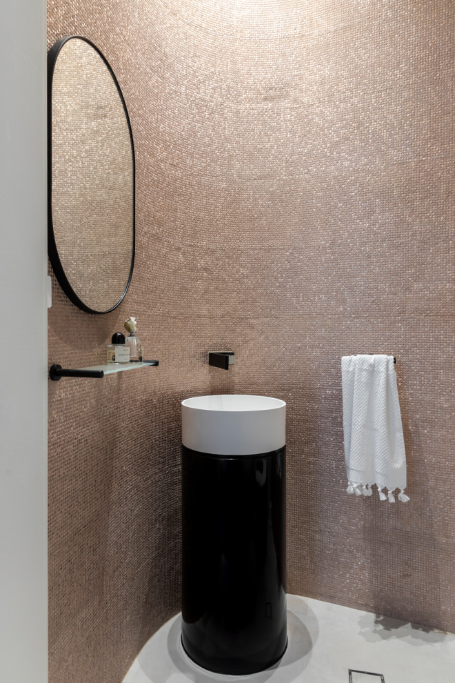 Design ideas for a contemporary cloakroom in Sydney with beige tiles, mosaic tiles, a console sink and grey floors.