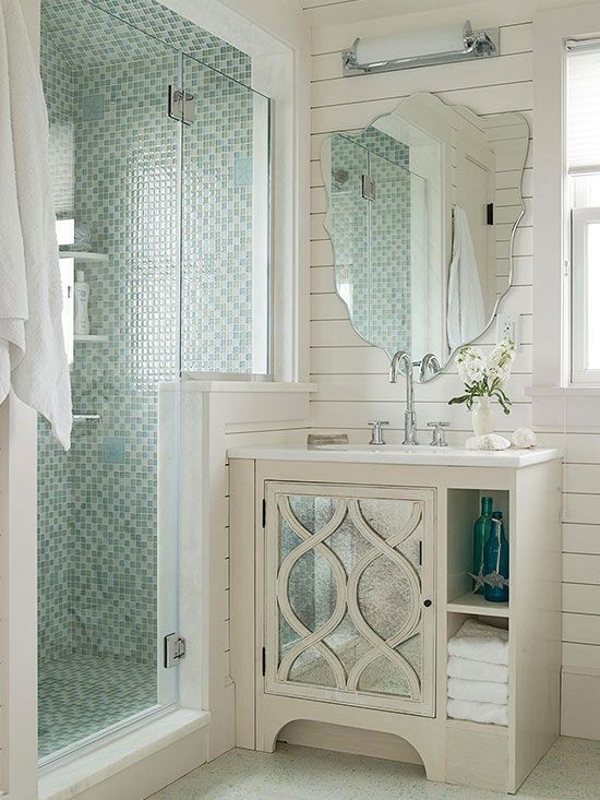 Small trendy blue tile and glass tile powder room photo in Phoenix with white cabinets, white walls, an undermount sink, quartz countertops and white countertops