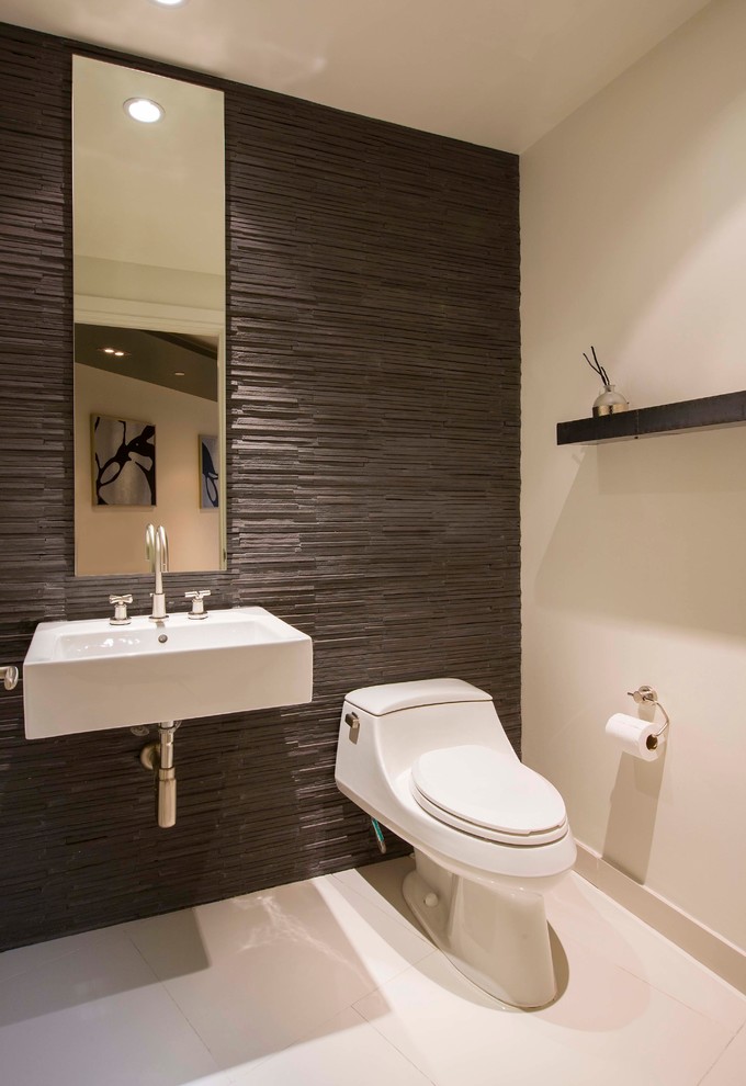 Inspiration for a small modern cloakroom in DC Metro with a wall-mounted sink, a one-piece toilet, white walls, porcelain flooring, brown tiles and slate tiles.