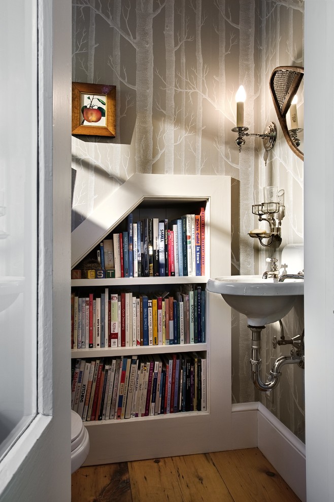 Powder room - traditional powder room idea in Burlington with a wall-mount sink