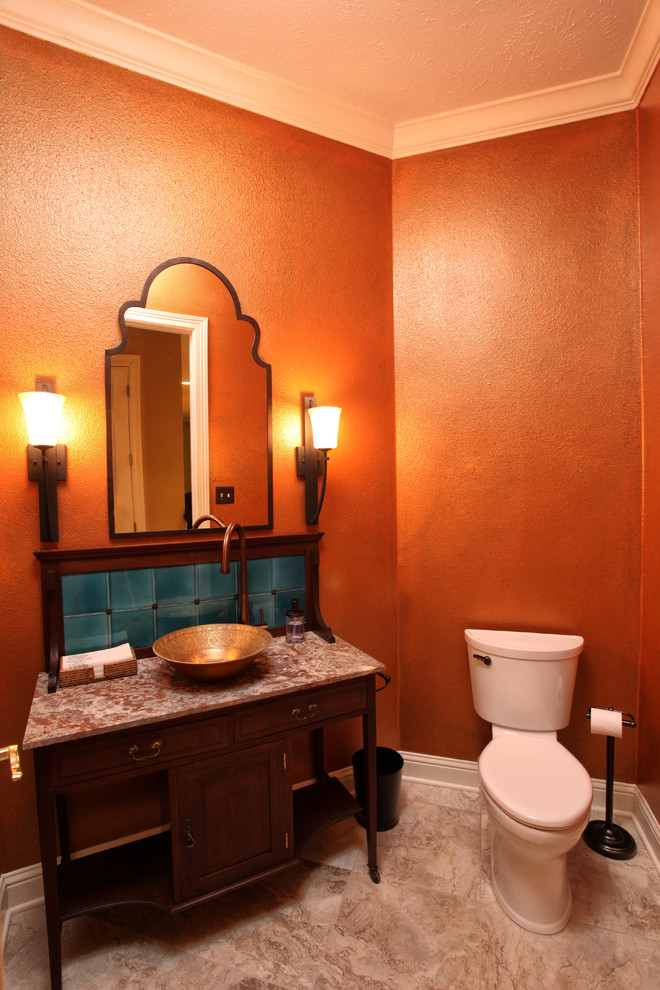 Transitional powder room photo in Houston