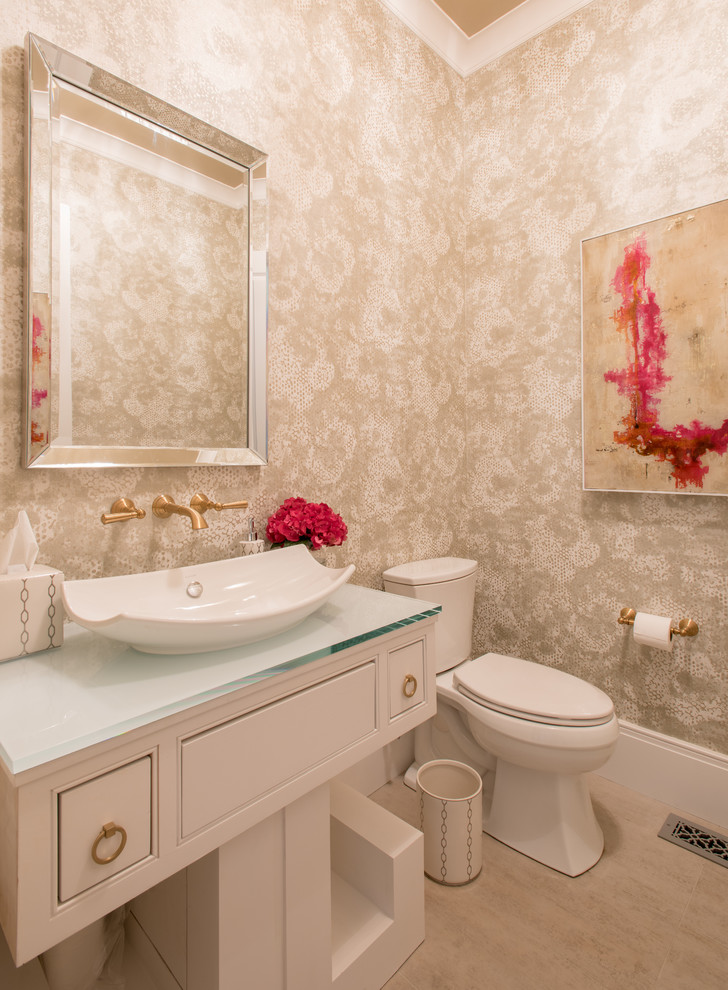 Photo of a traditional cloakroom in Dallas with beaded cabinets, white cabinets, a two-piece toilet, a vessel sink and grey floors.